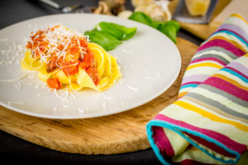 Fresh pasta with tomato sauce.