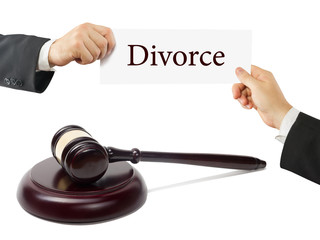 Wooden judges gavel on table in a courtroom or law enforcement office. Lawyer Hands holding...
