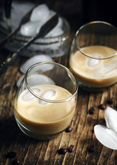 Irish creme liqueur in glass with ice.