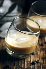 Irish creme liqueur in glass with ice.