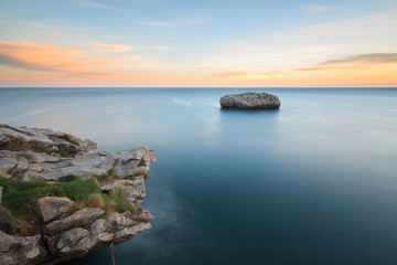 Cotonera island in Islares, Cantabria, Spain