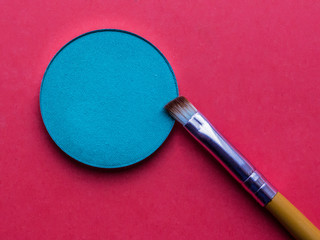 For Make-up. Bright shade with  brush on a pink background 