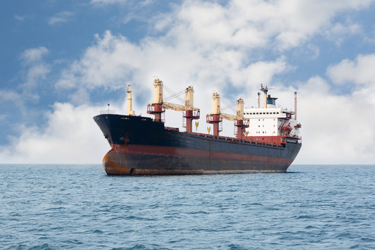 Dry cargo ship floating on the sea