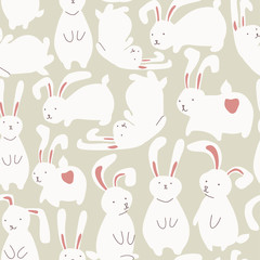 Obraz na płótnie Canvas Seamless pattern with cute white rabbits