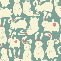 Seamless pattern with cute white rabbits