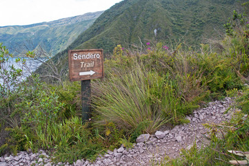 Trail sign on the pathway around the Cuicocha lake and volcanic crater