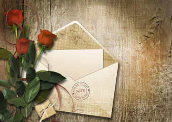 Valentine's card with envelope and roses in vintage wooden backg