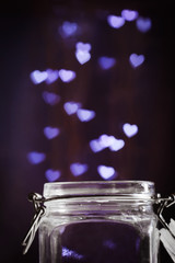 Love magic bottle on blurred background
