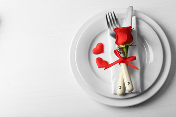 Festive table setting for Valentines Day on light background