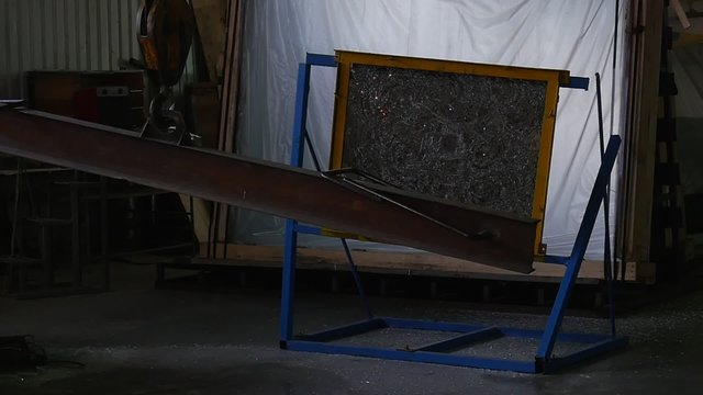 Glass Sheet in Metal Frame, Stand, Crackled Glass, Glass Sheet After Test with Battering Ram,Swaying Battering Ram Hanging on the Rope
