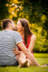 Young couple kissing on date