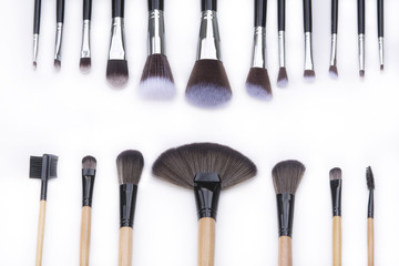 selection focus brushes for professional makeup artist on white background