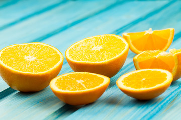Ripe orange fruit on wooden vintage background. Healthy vegetarian food. Recipe, menu, mock up, cooking.