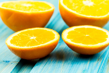 Ripe orange fruit on wooden vintage background. Healthy vegetarian food. Recipe, menu, mock up, cooking.