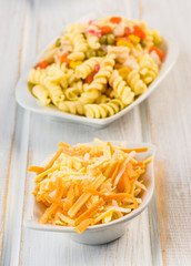 grated cheese and pasta salad