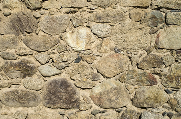 Old colorful stone wall closeup