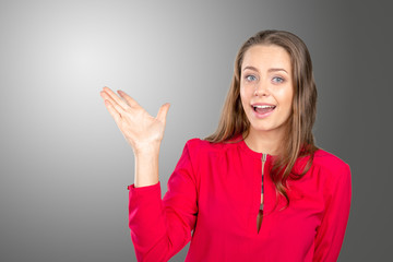 Young smile woman standing pointing her finger