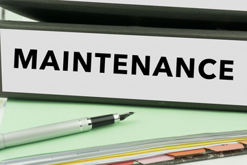 Maintenance - Ring Binder in the office. Maintenance file. Business Concept