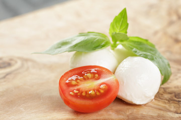 small mozzarella balls with plum tomato