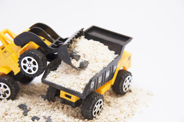 Toy cars are digging
