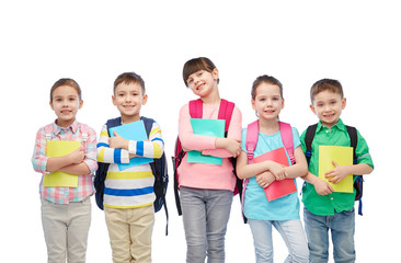 happy children with school bags and notebooks