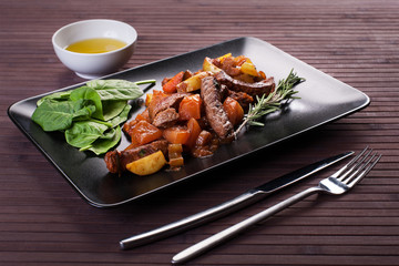 Braised veal on the plate.