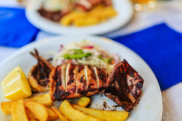 Greek cuisine - grilled squid, a dish