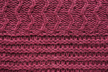 Purple red, cherry knitted sweater texture background. Space for copy, text, lettering.
