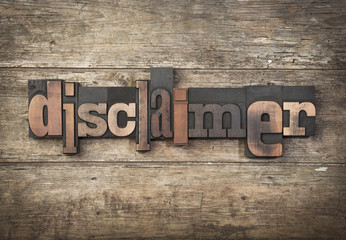 Fototapeta premium Disclaimer, word written with old printing blocks