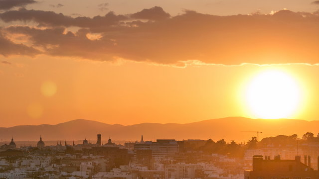 Sunset over the city timelapse View of Madrid, Spain. Photo taken from the hills of Tio Pio Park, Vallecas-Neighborhood.