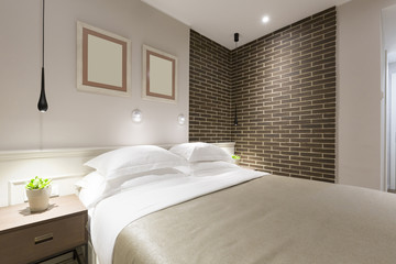 Modern bedroom interior in the evening