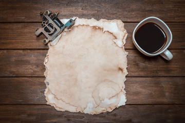 Machine For Tattoo Near Old Paper And Cup Of Coffee  