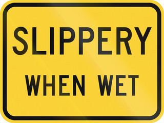 United States MUTCD road sign - Slippery when wet