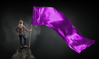 Woman with purple waving flag