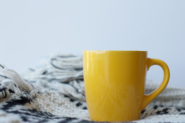 Yellow mug on white background