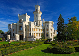 Fototapeta premium Beautiful renaissance castle Hluboka i the Czech Republic, with nice garden and blue sky