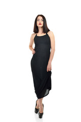 Full-length portrait of young fashion woman in black dress isola