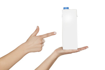 carton of milk in the women's hand