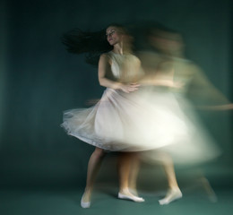 Ballet dancer woman in motion blur, ballerina