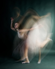 Naklejka premium Ballet dancer woman in motion blur, ballerina