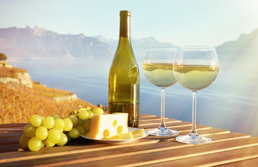 Wine and grapes against Geneva lake, Switzerland