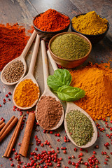 Fototapeta na wymiar Variety of spices on kitchen table