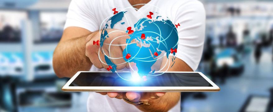 Businessman holding digital world map in his hands - Powered by Adobe