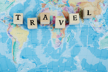 Travel spelled out in blocks on world map