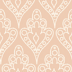 White lace on beige background