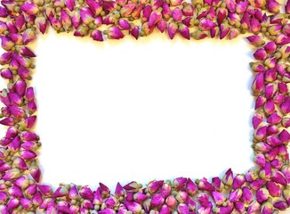 Border frame of romantic dried pink rose buds
