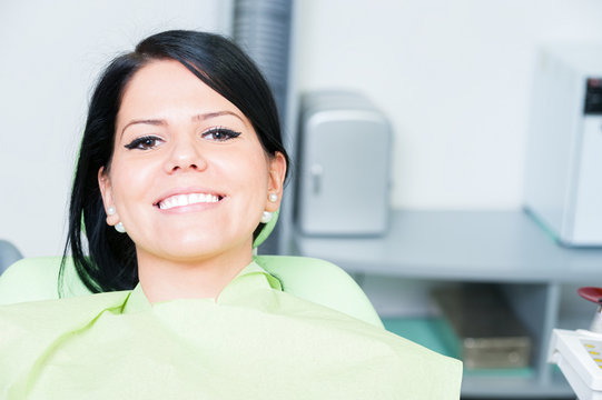 Young woman patient smiling cute at dentist