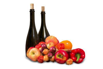 Group of various fruits and vegetables with bottles