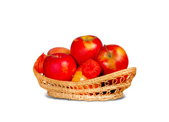 Ripe red apples in wicker basket