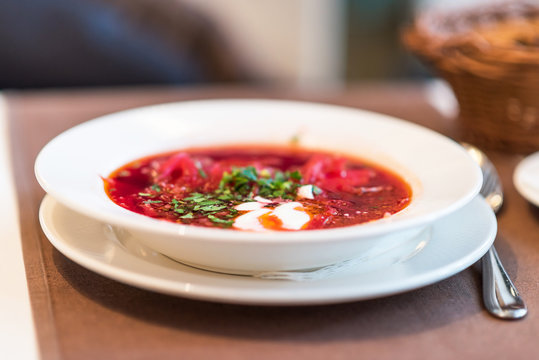 Red borscht soup with meat and dill